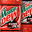 Red and green pixelated icon with stylized text reading 'MOUNTAIN DEW' in white outline, set against a red background with black borders.