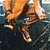 A 4-frame contact sheet of an animated icon showing a cartoon character in orange pants performing different poses against a dark background with light-colored text elements.