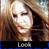 A static image of a person with long brown hair and dark eye makeup, overlaid with text reading 'Look what's brain-washing society now!' in white letters on black bars.