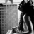 Black-and-white animated sequence showing a woman with voluminous curly hair walking left to right across tiled background, text overlays reading "YOUR VOICE IT CHASED" and "AWAY ALL THE SANITY IN HE".
