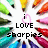 Pixelated icon with central text 'i LOVE sharpies' surrounded by colorful marker tips in a circular arrangement.