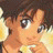 A 48x48 pixel buddy icon featuring a close-up of an anime-style character's face on the left and stylized text on a black background on the right, displayed as part of a contact sheet with two frames.