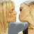 Animated contact sheet showing a blonde woman's profile kissing sequence with text overlay "The hottest kiss ever" on black background.
