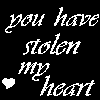 Black background with white and pink text reading 'you have stolen my heart' and heart symbols in various states of animation.