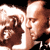 Static 50x50 pixel icon showing two side-by-side faces with brown hair and light skin tones against a black background, rendered in low-resolution pixel art style.