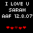 Black background with white pixelated text reading "I LOVE U SARAH AAF 12.8.07" and red heart symbols below, displayed in two identical side-by-side