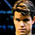 Static pixelated image of a person's face with light brown hair and blue background elements, likely from an AOL Instant Messenger buddy icon.