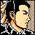 Pixelated static icon of a stylized human face in profile with orange and white dithering patterns on black background, featuring closed eyes and minimal facial features.