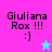 Pixelated text 'Giuliana Rox !!! :)' on split background with cyan star changing from light blue to pink.