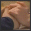 Animated sequence showing two figures in close physical contact , transitioning from side profile to frontal view