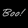 White handwritten-style text 'Boo!' on a solid black background with no additional elements.