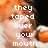 A four- of pixelated text over a person holding an orange microphone against dark background