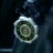 Animated icon shows a circular metallic object with rotating blades and central spiral, transitioning from closed to open state over dark background.