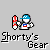 Pixel art character in blue cap and white shirt with red emblem, holding red-and-white object, displayed in with 'Shorty's Gear' text below