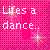 Pixelated pink background with white text reading 'Lifes a dance.. so dance it' and scattered starbursts, heart symbol.