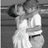 A static image with a bright green background, featuring a grayscale photo of two people embracing on the left and pink text reading "We should totally go inside joke makeout! lyl lauren allie".