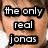 A static image of a person's face with text overlay reading 'the only real jonas' in black and white.