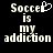 Two side-by-side pixelated text displays on black background, each reading "Soccer is my addiction" with left version featuring a heart-shaped cursor replacing the 'o' in "Soccer".