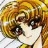 Anime-style character with brown hair and dark eyes, wearing a yellow top, depicted in a close-up with a blurred background.