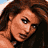 A 48x48 pixel animated contact sheet showing three sampled frames of a celebrity-style icon with brown hair and light skin, arranged in a 2x2 grid with one empty cell.