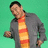 A pixelated image of a person in a gray jacket and striped shirt against a green background, with red text reading "Dee" in three separate locations.