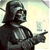 Pixelated static image of a dark armored figure in profile pointing right with one hand, set against a light gradient background.