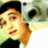 Pixelated image of a person holding a silver camera against a bright green background with four text labels in pixel font.