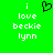 Green background with white pixelated text reading 'i love beckie lynn' and a black heart symbol above the left side of the text.
