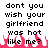 Pixelated text reads 'dont you wish your girlfriend was hot like me?' with red flame-like shapes beneath the words on a white background.