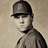 A split- image with a sepia-toned baseball player on the left and pixelated text on dark blue backgrounds. The right reads "Papelbon is LOVE." while the bottom-left says "GO SOX!"