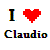 Pixelated static image featuring a black 'I', red heart symbol, and multicolored text reading 'Claudio' on white background.