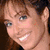 Two side-by-side pixelated portraits of women with distinct facial features and expressions, one smiling broadly on a purple background with text.