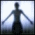 Pixelated figure with outstretched arms against light background, text overlay changes across frames from 'POUR YOUR MISERY DOWN' to 'POUR YOUR MISERY DOWN ON ME.'