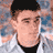 Static 48x48 pixel buddy icon showing a close-up of a person's face with short dark hair and light skin, wearing a white shirt over a black undershirt against a blurred background.