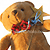 Pixelated brown teddy bear with red bow tie and blue collar, holding golden star against white background.