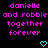 Black background with pink pixelated text reading "danielle and robbie together forever" and two cyan pixelated hearts below the text.