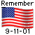Four identical display a waving American flag with 'Remember' text above and '9-11-01' below on gray background