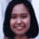 25 identical smiling faces with dark hair and white tops, arranged in five of five, each face showing slight variations in expression and background