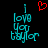 Two side-by-side pixelated text displays reading "I love you taylor" with a red heart above the left display on black background.