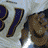 Pixelated football player in white uniform with blue and brown accents, helmet visible, text overlay reading JAMAL LEWIS and Reebok logo on dark background.