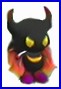 Static cartoon icon of a dark figure with horns, glowing eyes, and a red cape against a white background with blue border.