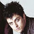 A 2x2 contact sheet of a Green Day-themed animated buddy icon featuring a person's face, bold text elements, and color-blocked sections with visible pixelation.