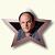A star-shaped avatar with a pixelated human face at its center, set against a light background.