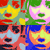 Animated sequence shows a stylized character with changing facial expressions and color schemes across multiple