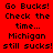 Red background with black pixelated text repeating 'Go Bucks! Check the time... Michigan still sucks!' in a pattern