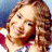 A 48x48 pixel animated buddy icon featuring a woman with curly brown hair and a red-and-white checkered top on the left, next to green text reading "Original Icons .com" on a dark green background.