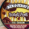 Circular Ben & Jerry's Fossil Fuel ice cream label with yellow background, brown and white text, and chocolate ice cream swirls.