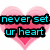 Two pink heart-shaped backgrounds with pixelated text overlays; left side displays cyan text "never set ur heart" and right side shows purple text "on 1 person".