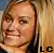 A pixelated image of a person with light brown hair and fair skin, showing two sequential facial expressions in side-by-side frames.