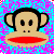 Pixelated monkey face with black hair, large ears, and red lips against a cyan background with pink pixel noise.